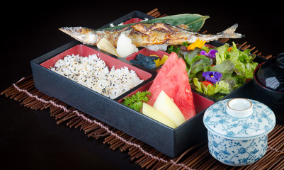 japanese cuisine. lunch box set on the background