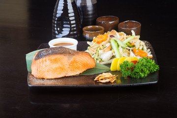 japanese cuisine. fried fish on the background
