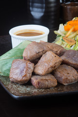 japanese cuisine. beef cube on the background