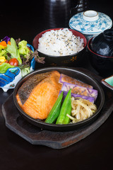 japanese cuisine. hot plate fish on the background