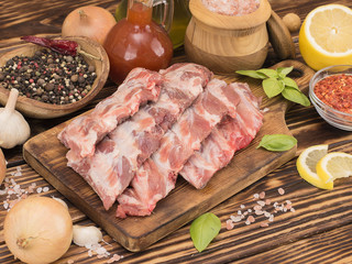 pork ribs on a wooden table. 
