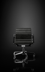 Modern elegant black office chair on wheels
