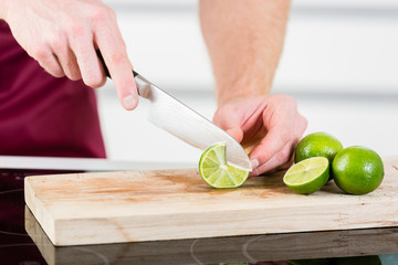 Man cutting fruits for cooking