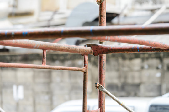 Scaffolding In Construction. Scaffold Pipe Clamp And Parts, Construction Site.