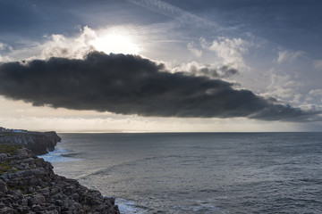 Fototapeta premium Clouds above Atlantic ocean at Portugal coast.