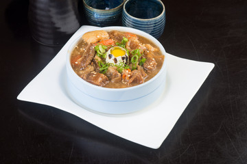 japanese cuisine. beef soup on the background