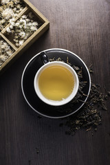 Tea on wood background.