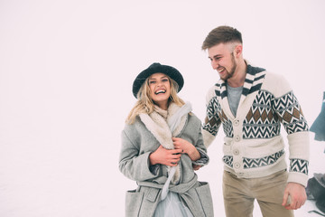 Photo of happy man and woman outdoor in winter