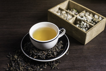 Tea on wood background.
