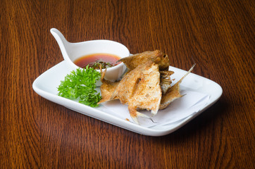 japanese cuisine. fried fish on the background