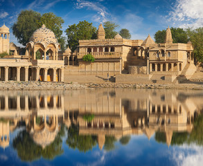 Fototapeta na wymiar Gadi Sagar temple on Gadisar lake Jaisalmer, India.