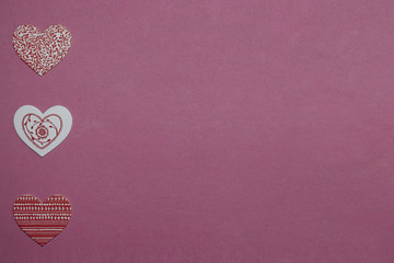 Pink background with white and red hearts. Love concept. Valentine's day. Greeting card background.