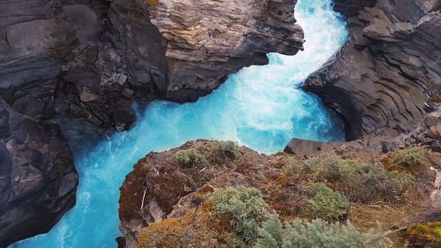 Blue water valley of Athabasca Falls in Jasper, Canada