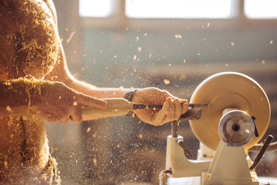 Wood Lathe, Lathe Naked Operator Working A Wood Pestle