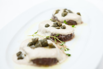 Sliced veal with sauce