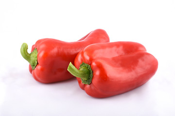 red peppers on white background