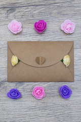 Fototapeta na wymiar Multi colored flowers in the envelope