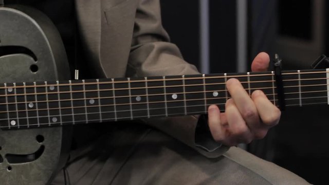 Blues steel guitar player