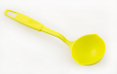 Plastic spoon on white background