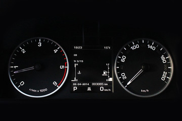 Car dashboard, illuminated panel, speed display. Car. Black