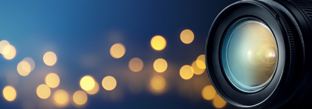 Camera lens with bokeh lights background