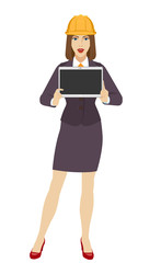 Businesswoman construction helmet showing blank digital tablet PC