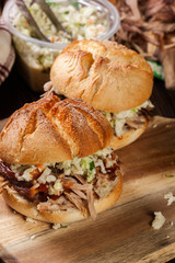 Homemade pulled pork burger with coleslaw salad