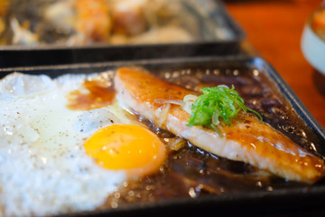 Salmon teriyaki grilled in teriyaki sauce