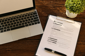 resume paper on desk.Business Concept