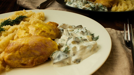 Chicken thighs with couscous in Tunisian.