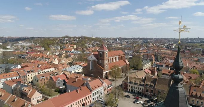 AERIAL. Church of St. Francis Xavier and Town Hall above square in Kaunas downtown, Kaunas, Lithuania.