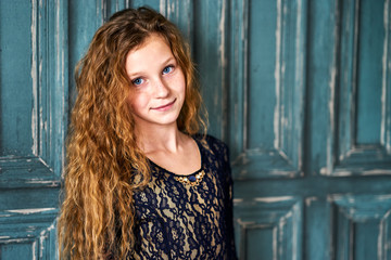 Fototapeta premium Portrait of red-haired girl
