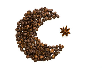 Roasted coffee beans and anise star forming Turkish emblem.