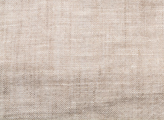 Fototapeta premium Beige linen background.