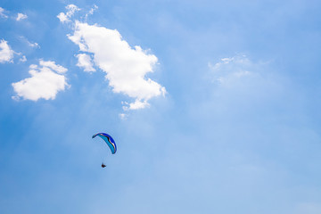 Belo Horizonte, Minas Gerais, Brazil. Paraglider flying from top of the world mountain