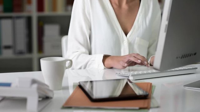 Woman connecting with her computer and social networking