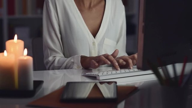 Woman connecting with her computer and social networking