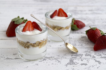 Natural homemade yogurt on a light background.