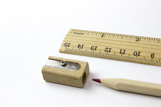 Wood ruler, pencil and pencil sharpener. Free royalty images.