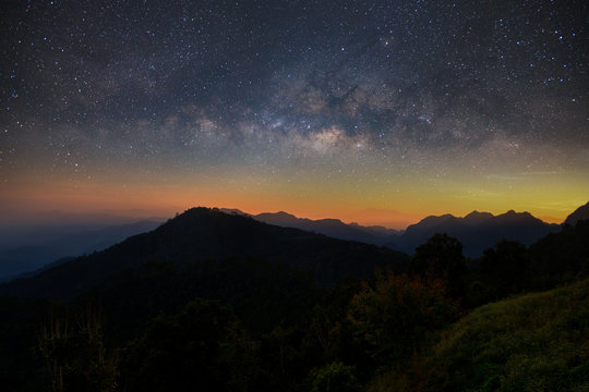 Beautiful mountain landscape with Milky way galaxy at Monson viewpoint Doi AngKhang, Chaingmai Thailand