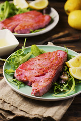 Cooked delicious tuna fish with green salad