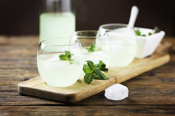 Summer cocktail with rum, ice and mint