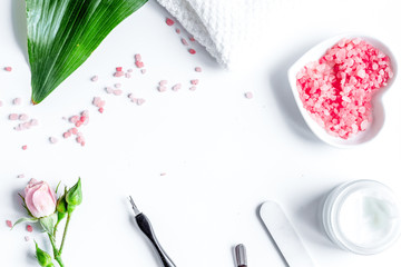 salt and cream for nail care in spa top view