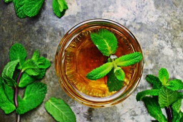 Fresh mint tea close up. Herbal tea drink  top view © topotishika