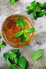 Fresh mint tea close up. Herbal tea drink  top view © topotishika