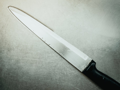 stainless brade knife after clean in sink with murder , horror concept background