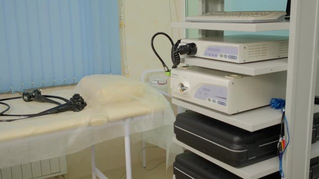 Gastroscopy device in a medical room