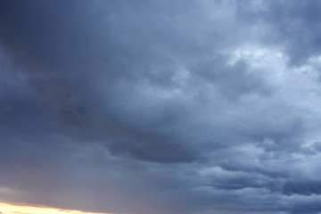 Naklejka na ściany i meble Dramatic stormy dark cloudy sky