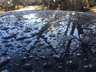 dangerous black ice on car top