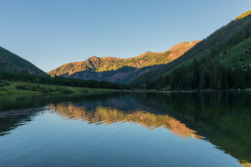 Fototapeta na wymiar Scenic Reflection in a Colorado Wilderness Lake in Summer